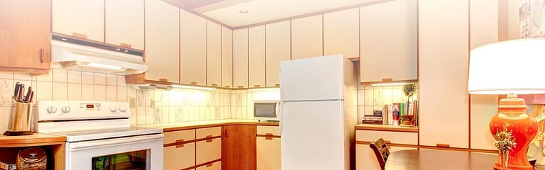 Why Use a Local Painter to Repaint Kitchen Cabinets?
